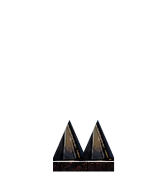 Two dark stone spikes with pale metal tips, standing about knee high.